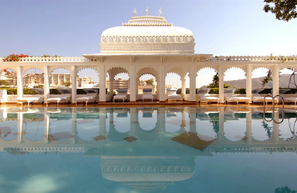 Exterior view of Taj Lake Palace Udaipur floating on Lake Pichola at sunset, Rajasthan, India.